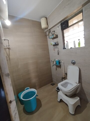 Bathroom in 2 BHK Apartment at Cosmos Jewels, Ghodbunder Road – for Sale