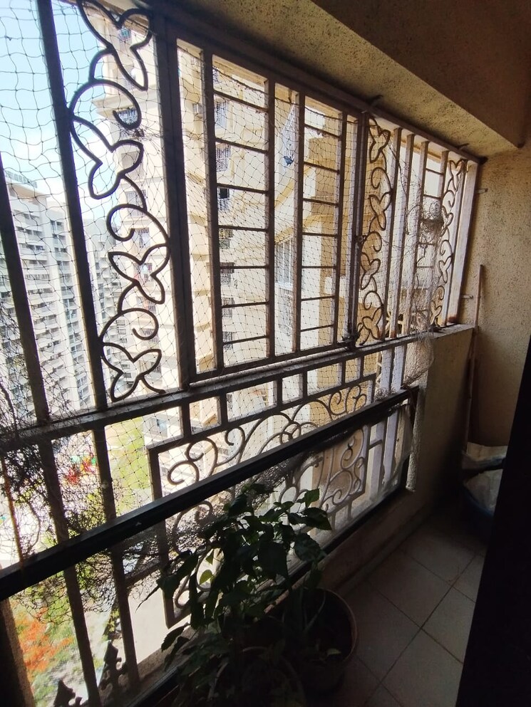 Balcony, cosmos-jewels 2 Bedroom 600 Sq.Ft. Apartment In Ghodbunder Road Thane 8322853