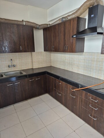 Kitchen in 3 BHK Apartment at Tarun CGHS, Sector 47 – for Rent