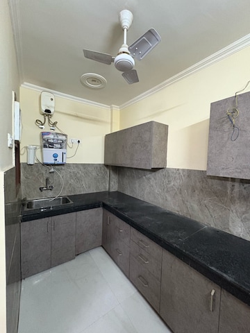 Kitchen in 2 BHK Apartment at Shree Vardhman Green Court, Sector 90 – for Rent