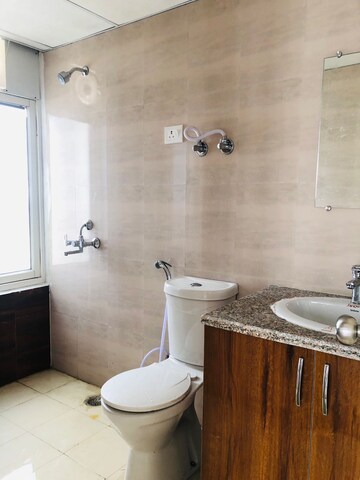Bathroom in 2.5 BHK Apartment at Mahagun Mantra I, Sector 10 Greater Noida – for Rent