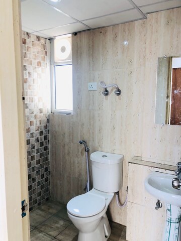 Bathroom in 2.5 BHK Apartment at Mahagun Mantra I, Sector 10 Greater Noida – for Rent