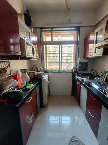 Kitchen in 2 BHK Apartment at Vasant Fiona, Pokhran Road No 2 – for Rent