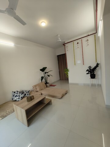 Living Room in 1 BHK Apartment at Ashar Axis, Majiwada – for Rent