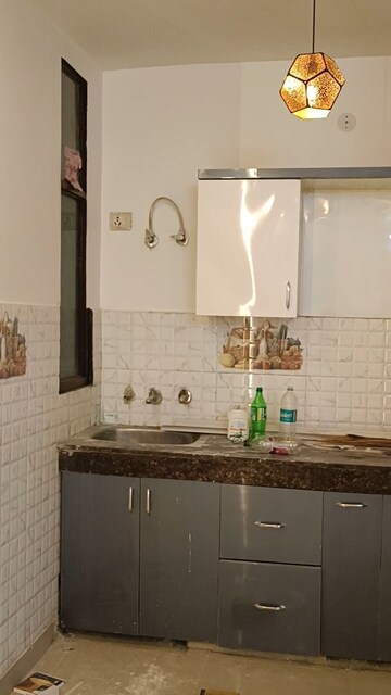 Kitchen in 3 BHK Builder Floor at Shalimar Garden Extension 2 – for Sale