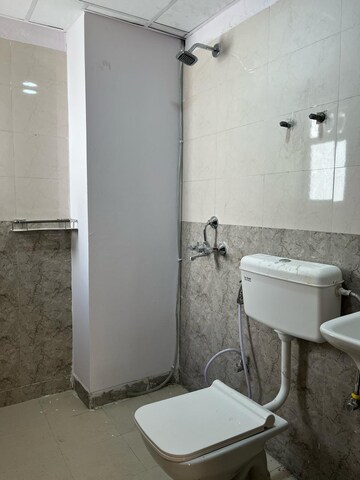 Bathroom in 3 BHK Apartment at ROF Amaltas, Sector 92 – for Rent