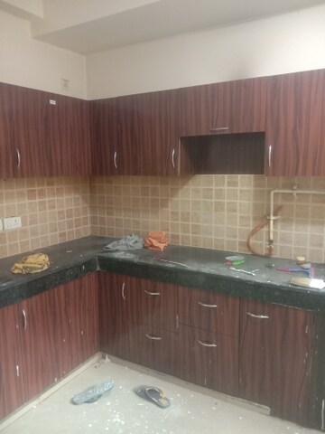Kitchen in 3 BHK Apartment at Mahagun Mywoods, Sector 16c Greater Noida – for Rent