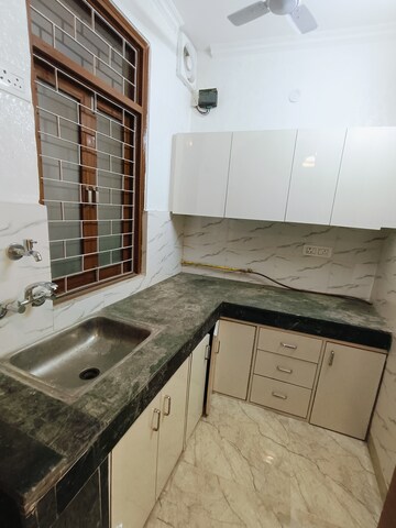 Kitchen in 1.5 BHK Builder Floor at Malviya Nagar – for Sale