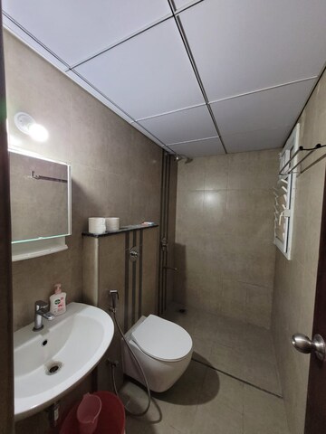 Bathroom in 3 BHK Apartment at Puravankara Silversands, Mundhwa – for Rent