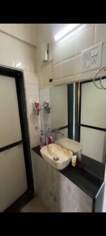 Bathroom in 1 BHK Apartment at Puranik City, Kasarvadavali – for Sale