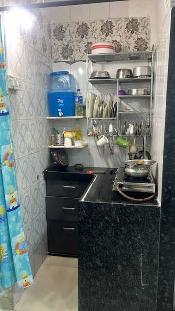 Kitchen in 1 RK Apartment at Self Help CHS, Vile Parle West – for Rent