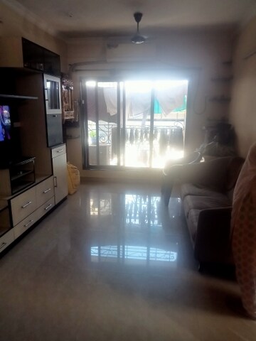 Living Room in 2 BHK Apartment at Omkareshwar CHS Dahisar West, Dahisar West – for Rent