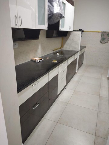 Kitchen in 2 BHK Apartment at Prestige Song Of The South, Yelenahalli – for Sale