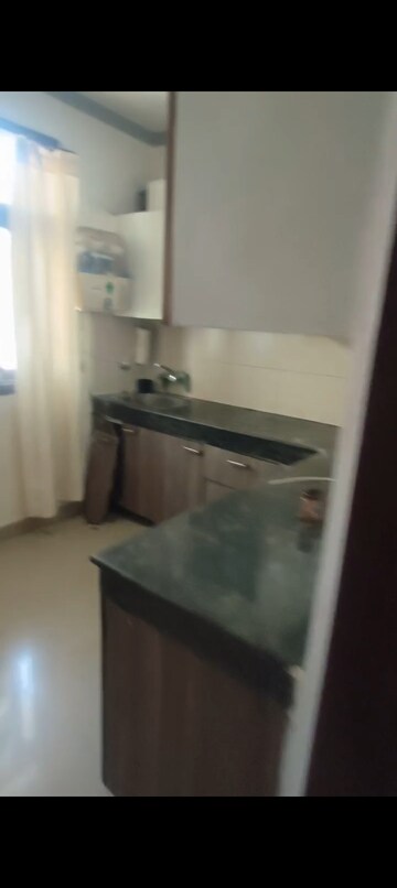 Kitchen in 2 BHK Apartment at Maya Garden City, Lohgarh – for Rent