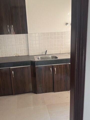 Kitchen in 3 BHK Apartment at Ramprastha City The Edge Towers, Sector 37d – for Rent