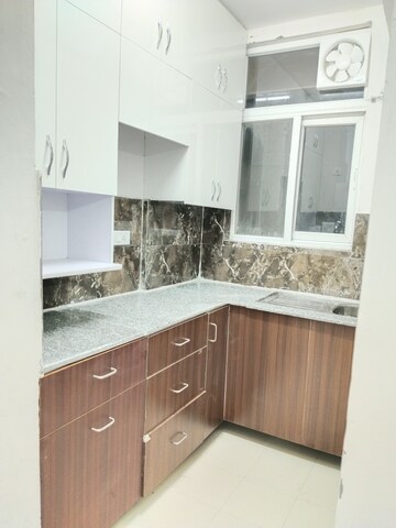 Kitchen in 2.5 BHK Apartment at Amrapali Riverview, Amrapali Leisure Valley – for Rent