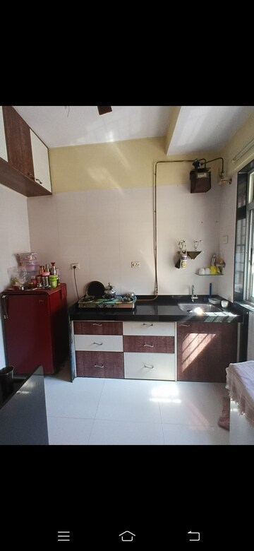 Kitchen in 1.5 BHK Apartment at Vasant Fiona, Pokhran Road No 2 – for Rent