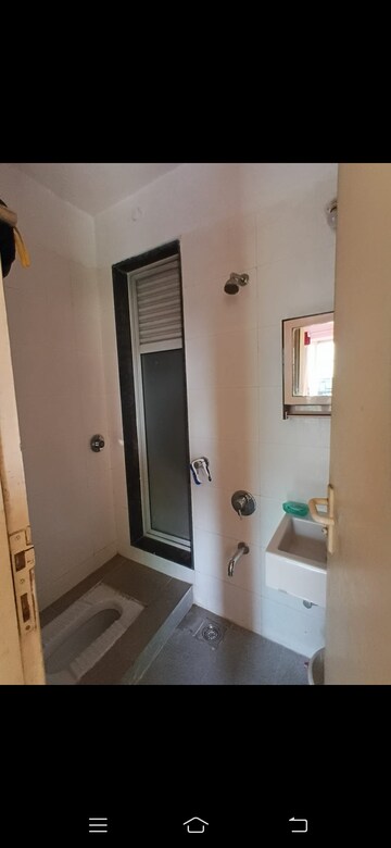 Bathroom in 1.5 BHK Apartment at Vasant Fiona, Pokhran Road No 2 – for Rent