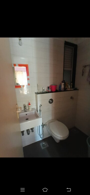 Bathroom in 1.5 BHK Apartment at Vasant Fiona, Pokhran Road No 2 – for Rent