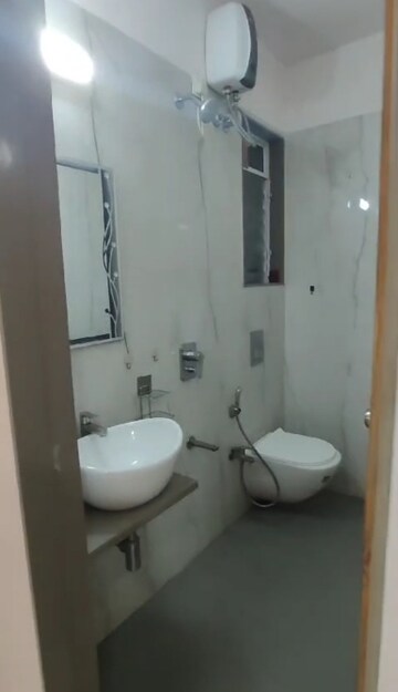 Bathroom in 1 BHK Apartment at Rishabraj Pride, Dahisar West – for Rent