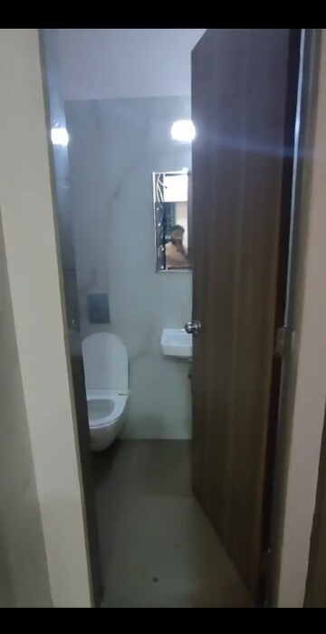Bathroom in 1 BHK Apartment at Rishabraj Pride, Dahisar West – for Rent