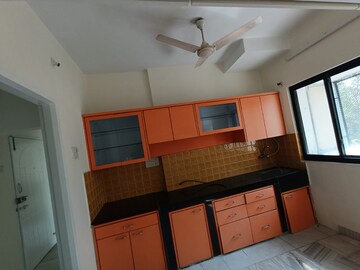 Kitchen in 2 BHK Apartment at Omkar Alta Monte, Malad East – for Rent