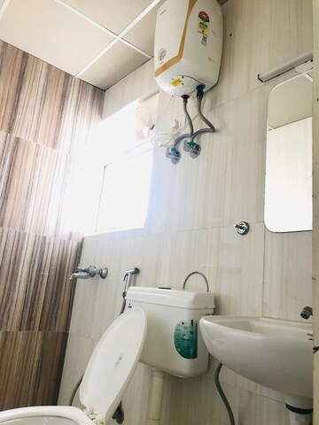 Bathroom in 2 BHK Apartment at Signature Global Proxima, Sector 89 – for Rent