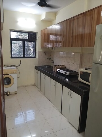 Kitchen in 2 BHK Apartment at Planet Powai CHS, Powai – for Rent