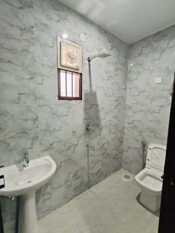 Bathroom in 1.5 BHK Builder Floor at Dharam Flats, Palam Vihar Extension – for Rent