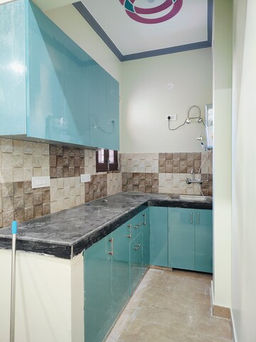 Kitchen in 1.5 BHK Builder Floor at Dharam Flats, Palam Vihar Extension – for Rent