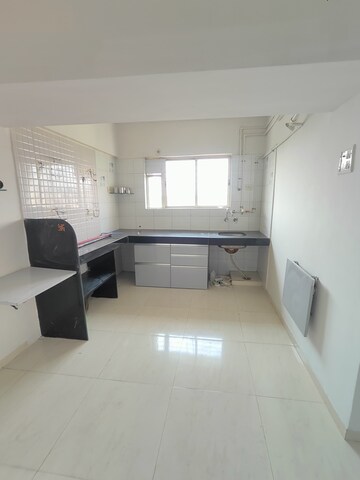 Kitchen in 1 BHK Apartment at Wadgaon Sheri – for Sale