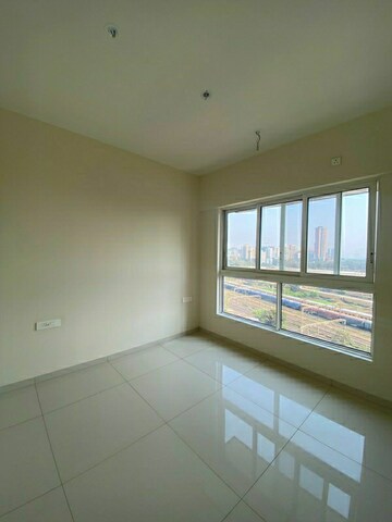 Room in 2 BHK Apartment at Wadhwa Atmosphere O2, Mulund West – for Rent
