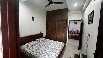 Bedroom in 3 BHK Builder Floor at Dhakoli Village – for Sale