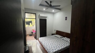 Bedroom in 3 BHK Builder Floor at Dhakoli Village – for Sale