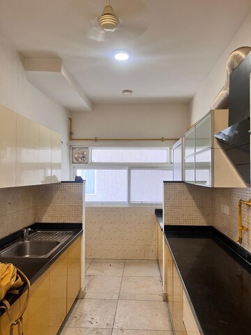 Kitchen in 2 BHK Apartment at Prestige Song Of The South, Yelenahalli – for Rent