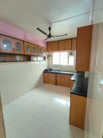 Kitchen in 2 BHK Apartment at Wadgaon Sheri – for Rent