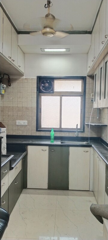 Kitchen in 2 BHK Apartment at Runwal Heights, Mulund West – for Rent