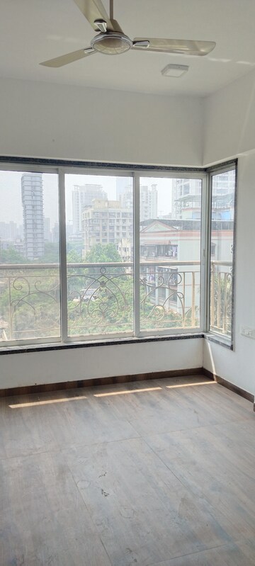 Master Bedroom in 3 BHK Apartment at New Happy Life CHS, Mulund West – for Sale