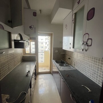 Kitchen in 2.5 BHK Apartment at Nimbus The Hyde park, Sector 78 – for Rent