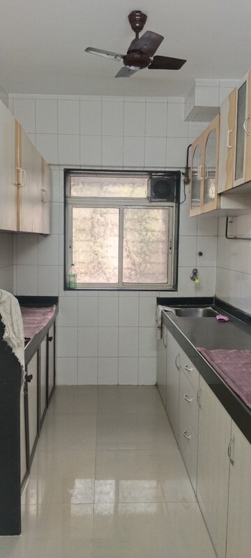 Kitchen in 2 BHK Apartment at Nirmal Lifestyle Residency CHS Ltd, Mulund West – for Sale