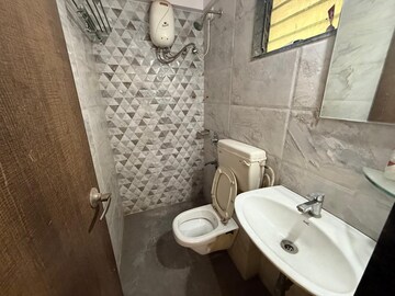 Bathroom in 2 BHK Apartment at Seawoods – for Sale