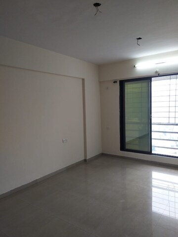 Living Room in 2 BHK Apartment at Kesar Exotica, Kharghar Sector 10 – for Sale