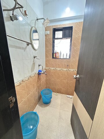 Bathroom in 1 BHK Apartment at Mantri Park, Goregaon East – for Rent