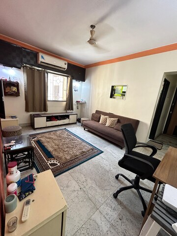Living Room in 1 BHK Apartment at Mantri Park, Goregaon East – for Rent