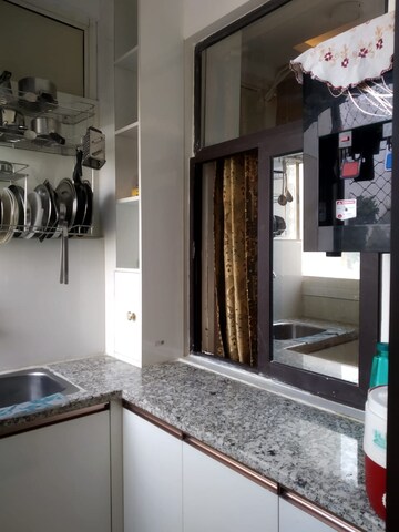 Kitchen in 4 BHK Apartment at Raj Nagar Extension – for Sale