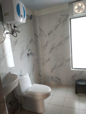 Bathroom in 4 BHK Apartment at Raj Nagar Extension – for Sale