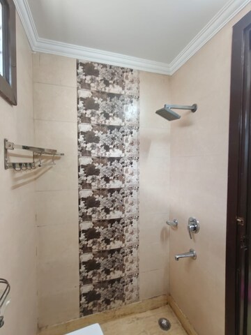 Bathroom in 2 BHK Apartment at Lajpat Nagar – for Sale