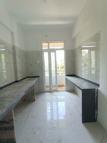 Kitchen in 2 BHK Apartment at Dombivli West – for Sale