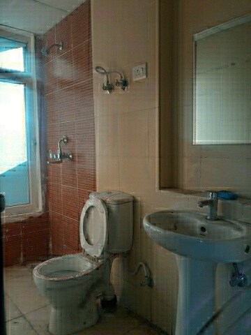 Bathroom in 3 BHK Apartment at Mahagun Mywoods, Sector 16c Greater Noida – for Rent