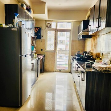 Kitchen in 2.5 BHK Apartment at Prateek Laurel, Sector 120 – for Rent